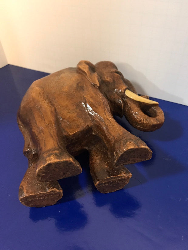 Syroco Wood Elephant Figure with White Tusks and Curled Trunk  from the 1940s